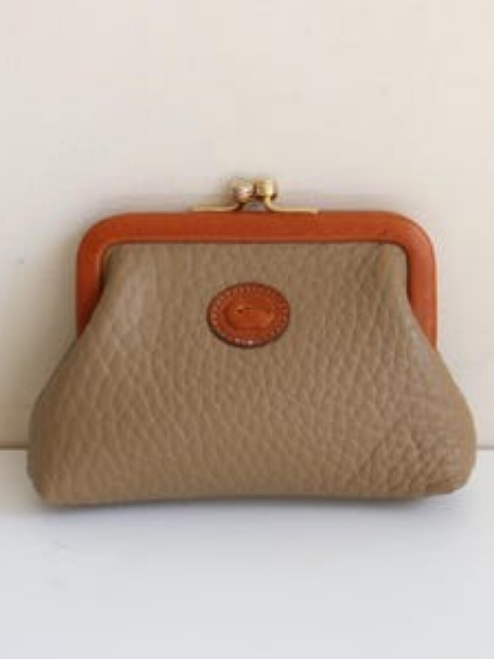 Dooney & Bourke Pebbled Taupe Leather Kiss-Lock Wristlet with Tan Trim